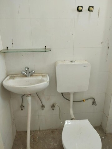 Bathroom in 3 BHK Apartment at Adore Happy Homes Exclusive, Sector 86 – for Sale