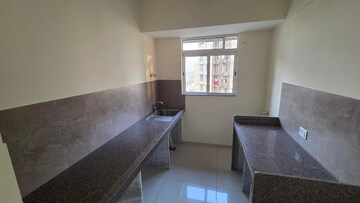 Kitchen in 1 BHK Apartment at Godrej Nest Kandivali, Kandivali East – for Rent