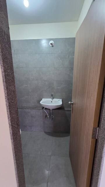 Bathroom in 1 BHK Apartment at Godrej Nest Kandivali, Kandivali East – for Rent