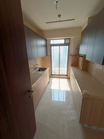 Kitchen in 2 BHK Apartment at Piramal Vaikunth, Balkum Pada – for Rent