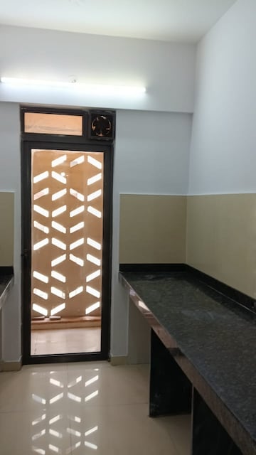Kitchen in 2 BHK Apartment at Lodha Palava Downtown, Dombivli East – for Rent