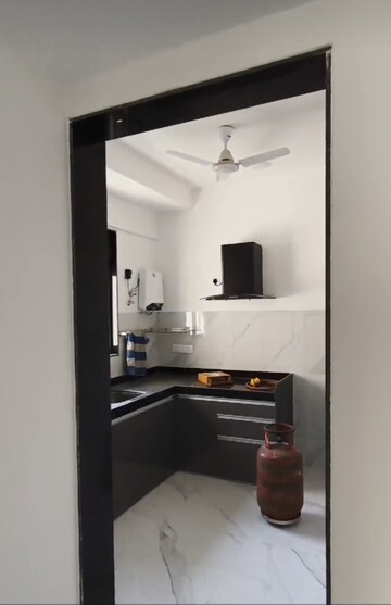 Kitchen in 2 BHK Apartment at Dev Leo Tower, Oshiwara – for Rent