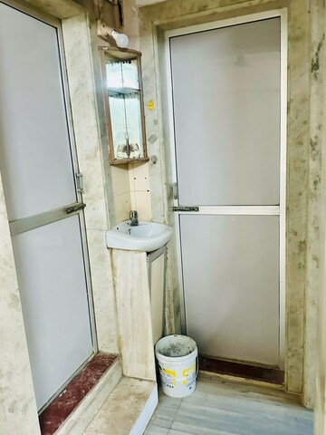 Bathroom in 1 BHK Apartment at Ajay Apartments CHS, Goregaon East – for Rent