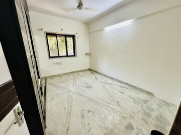 Room in 1 BHK Apartment at Ajay Apartments CHS, Goregaon East – for Rent