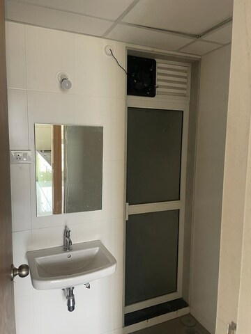 Bathroom in 1 BHK Apartment at Puranik City Reserva, Ghodbunder – for Rent