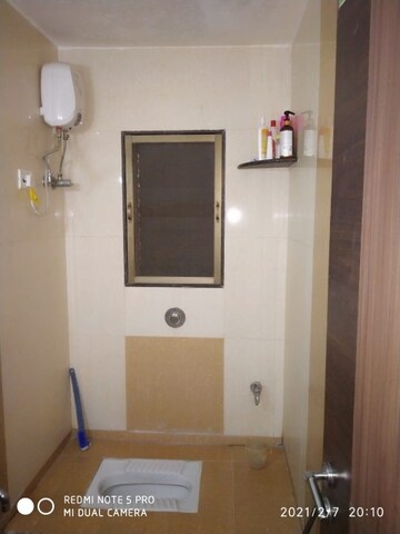 Bathroom in 1 BHK Apartment at Raunak Bliss, Ghodbunder Road – for Rent