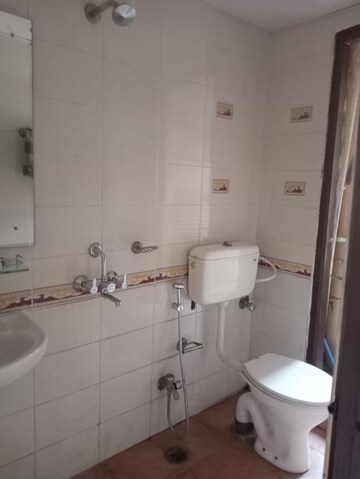 Bathroom in 3 BHK Apartment at AWHO Tucker Vihar, Hadapsar – for Rent