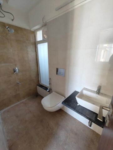 Bathroom in 1 BHK Apartment at Omkar Signet, Malad East – for Rent