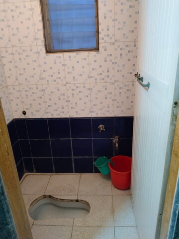 Bathroom in 2 BHK Apartment at Indralok CHS, Khanda Colony – for Rent