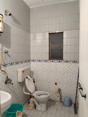 Bathroom in 2 BHK Apartment at Indralok CHS, Khanda Colony – for Rent