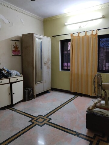 Bedroom in 2 BHK Apartment at Indralok CHS, Khanda Colony – for Rent