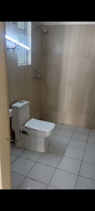 Bathroom in 3 BHK Apartment at JKG Palm Resort, Raj Nagar Extension – for Sale