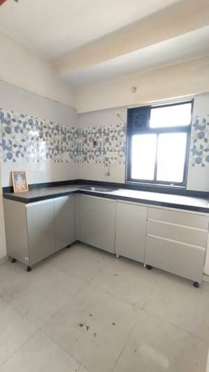 Kitchen in 1 BHK Apartment at Raunak City Sector 4, Kalyan West – for Sale