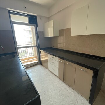 Kitchen in 2 BHK Apartment at JP Decks, Mira Nagar – for Rent