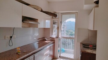 Kitchen in 3 BHK Apartment at DLF Regal Gardens, Sector 90 – for Rent