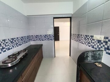 Kitchen in 2.5 BHK Apartment at Apoorva Grace CHS, Chembur – for Rent