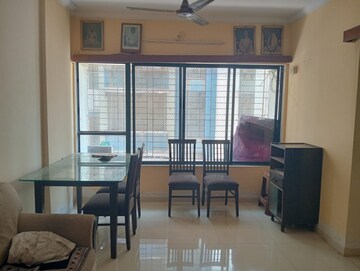 Living Room in 1 BHK Apartment at Bindra Complex, Andheri East – for Rent