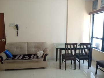 Living Room in 1 BHK Apartment at Bindra Complex, Andheri East – for Rent
