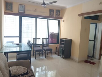 Living Room in 1 BHK Apartment at Bindra Complex, Andheri East – for Rent