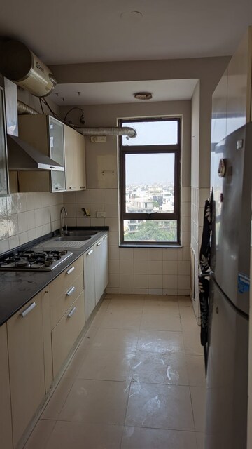 Kitchen in 3.5 BHK Apartment at Unitech Fresco, Sector 50 – for Rent