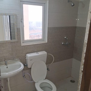 Bathroom in 2 BHK Apartment at Signature Global Orchard Avenue, Sector 93 – for Sale