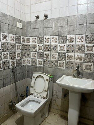 Bathroom in 3 BHK Builder Floor at Vasundhara Sector 1 – for Sale