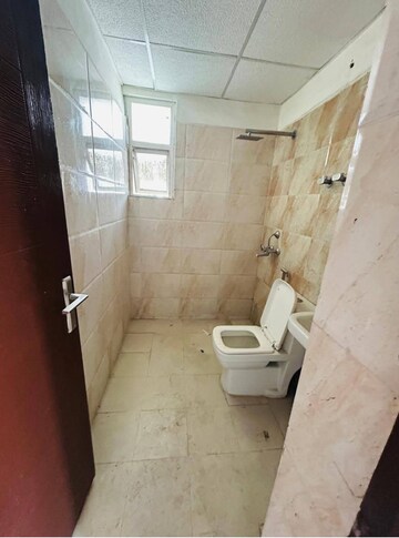 Bathroom in 3 BHK Apartment at Ajnara Le Garden, Sector 16b Greater Noida – for Rent