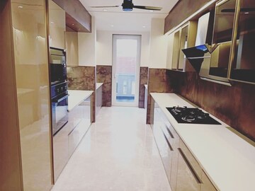 Kitchen in 3.5 BHK Apartment at Ambience Island, Sector 24 – for Sale