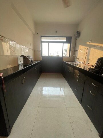 Kitchen in 2 BHK Apartment at Shubh Gateway, Viman Nagar – for Rent