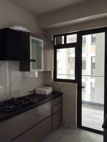 Kitchen in 4 BHK Apartment at Emaar Palm Terraces Select, Sector 66 – for Sale