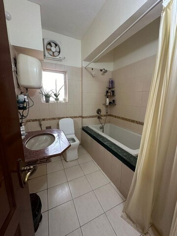 Bathroom in 5 BHK Apartment at Ambience Island, Sector 24 – for Sale