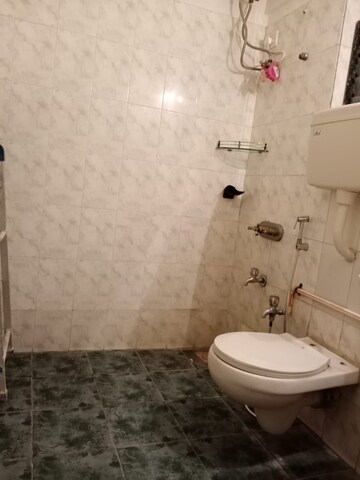 Bathroom in 2 BHK Apartment at Montreal Tower, Andheri West – for Rent