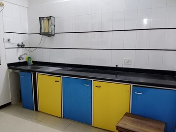 Kitchen in 2 BHK Apartment at Montreal Tower, Andheri West – for Rent