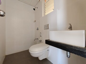Bathroom in 2 BHK Apartment at Godrej Emerald, Ghodbunder Road – for Rent