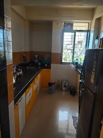 Kitchen in 2 BHK Apartment at Ajmera Heights, Kalyan West – for Sale