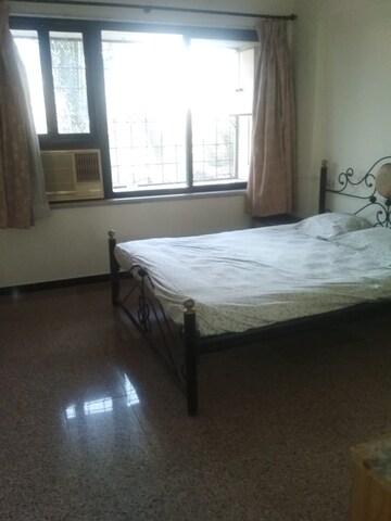 Bedroom in 3 BHK Apartment at Aruna Smruti Apartment, Borivali East – for Rent