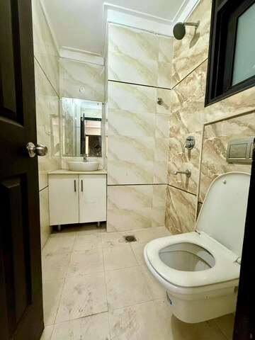 Bathroom in 3 BHK Apartment at Golden Sand Apartments, Dhakoli Village – for Rent