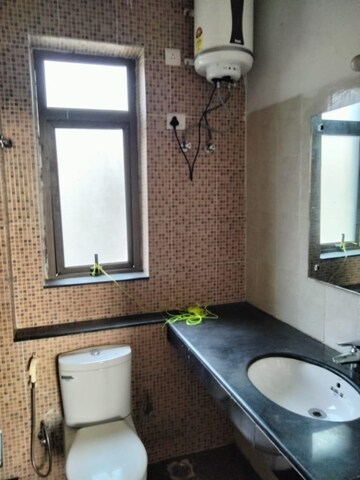 Bathroom in 2 BHK Apartment at Unitech Uniworld Resorts-The Residences, Sector 33 – for Rent