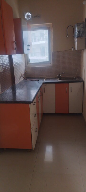 Kitchen in 1 RK Apartment at Antriksh Golf View, Sector 78 – for Rent