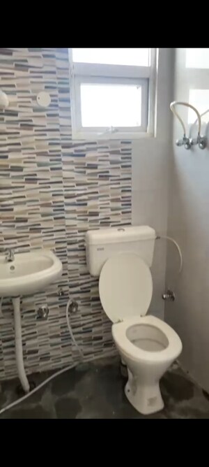 Bathroom in 2 BHK Apartment at Signature Global Orchard Avenue, Sector 93 – for Sale