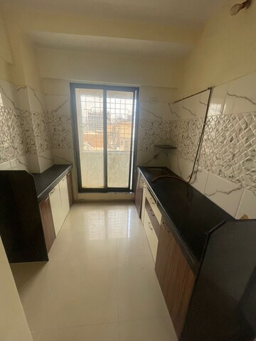 Kitchen in 1 BHK Apartment at Christine Heights, Mira Road – for Sale