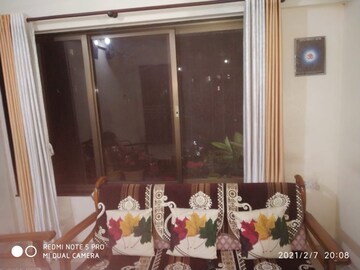 Living Room in 1 BHK Apartment at Raunak Bliss, Ghodbunder Road – for Rent