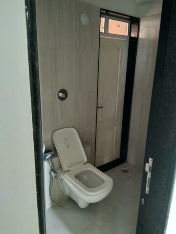 Bathroom in 1 BHK Apartment at Raunak Bliss, Ghodbunder Road – for Rent