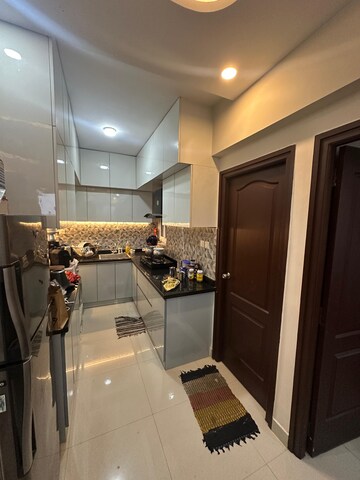 Kitchen in 1 BHK Apartment at SJR Blue Waters, Off Sarjapur Road – for Rent
