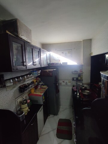 Kitchen in 2 BHK Apartment at Shree Ostwal Orchid, Mira Road – for Sale