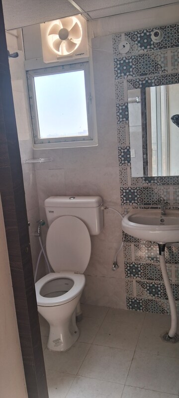 Bathroom in 2 BHK Apartment at Signature Global Proxima, Sector 89 – for Rent
