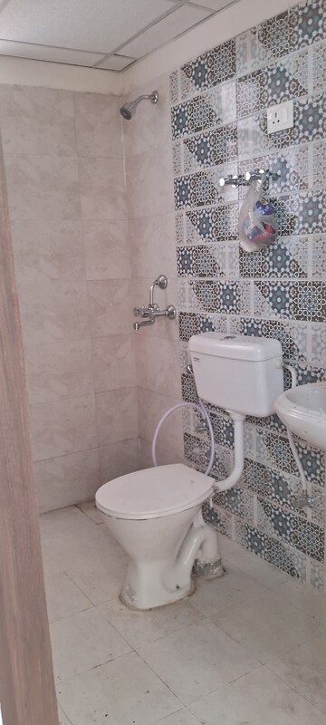 Bathroom in 2 BHK Apartment at Signature Global Proxima, Sector 89 – for Rent