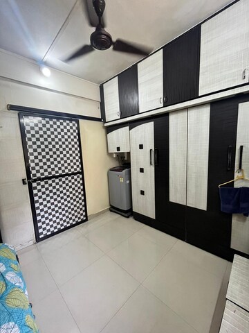Kitchen in 1 BHK Apartment at Dak Sangathan CHS, Malad East – for Rent