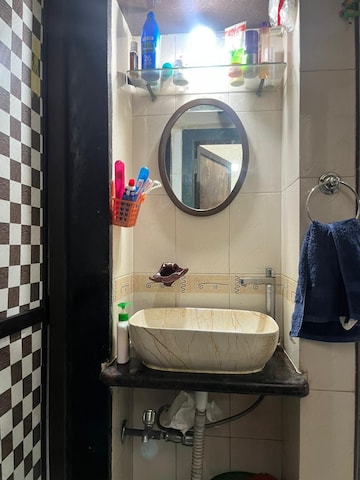 Bathroom in 1 BHK Apartment at Dak Sangathan CHS, Malad East – for Rent