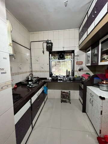 Kitchen in 1 BHK Apartment at Dak Sangathan CHS, Malad East – for Rent